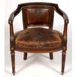 A FRENCH MAHOGANY AND BRASS DESK CHAIR IN EMPIRE STYLE, ON STOP FLUTED LEGS, C1900 Leather heavily