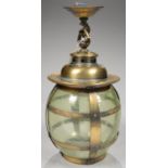 AN OXIDISED BRASS EARLY ELECTRIC HALL LANTERN OF BARREL SHAPE WITH FLECKED GREEN GLASS SHADE, 32CM