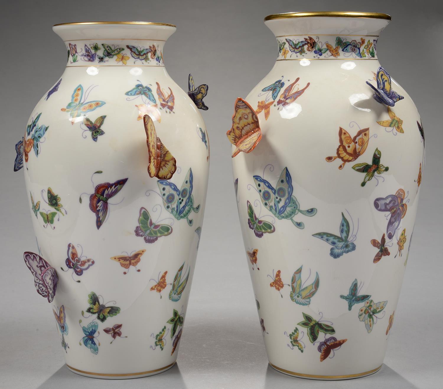 A PAIR OF MALAYSIAN EARTHENWARE VASES, APPLIED WITH AND DECORATED WITH BUTTERFLIES AND MOTHS,