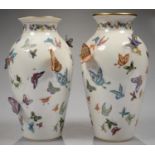 A PAIR OF MALAYSIAN EARTHENWARE VASES, APPLIED WITH AND DECORATED WITH BUTTERFLIES AND MOTHS,