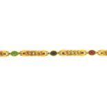 A 9CT GOLD BRACELET WITH FOUR OVAL VARI-COLOURED GEM CABOCHONS AT INTERVALS, APPROXIMATELY 160MM,