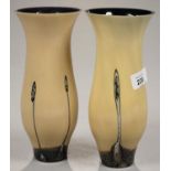 A PAIR OF MOTTLED BLACK AND WHITE AND MUSTARD YELLOW MODERNIST CASED GLASS VASES, 22CM H Good