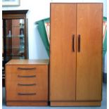 A G-PLAN TEAK WARDROBE, 175CM H; 85 X 58CM AND A CHEST OF DRAWERS EN SUITE, 73CM H; 71 X 44CM, C1970