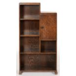 AN ASYMMETRICAL OAK OPEN BOOKCASE, INCORPORATING A CUPBOARD, 103CM H; 58 X 23CM, C1930 Good, clean