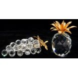 SWAROVSKI  CRYSTAL AND GILT PINEAPPLE AND BUNCH OF GRAPES, 10.5 AND 17CM RESPECTIVELY, ORIGINAL