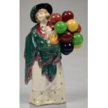 A ROYAL DOULTON EARTHENWARE FIGURE OF THE BALLOON SELLER, 23CM H, PRINTED MARK, PAINTED TITLE AND