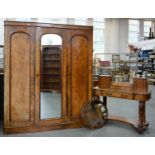 A VICTORIAN WALNUT DRESSING TABLE IN BUTTERFLY VENEERS ON CARVED LEGS, 97CM H; 121 X 52CM (OVAL