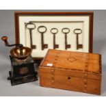 A VICTORIAN CAST IRON AND BRASS COFFEE MILL BY J AND J SIDDONS, WITH DRAWER, CRANK AND LIGNUM