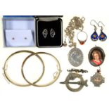 TWO SILVER BANGLES AND A LOCKET, AN IRISH SILVER GILT CELTIC REVIVAL BROOCH, A PAIR OF GOLD EAR