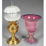 AN ETCHED PINK AND BLUE GLASS BELL SHAPED TABLE LAMP, 32CM H AND A BRASS OIL LAMP  Both in good