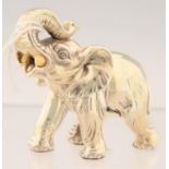 A MINIATURE SILVER SCULPTURE OF AN ELEPHANT, 6CM H, IMPORT MARKED LONDON 1992 Formerly with tusks