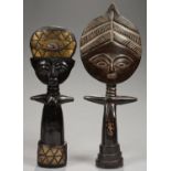 TRIBAL ART. TWO AFRICAN CARVED WOOD DOLLS, ONE INLAID WITH METAL AND BEADS, 45.5CM AND 54CM H AND AN
