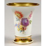 A MEISSEN VASE, FLARED CYLINDRICAL AND PAINTED WITH LOOSE BOUQUETS BETWEEN BURNISHED GILT BORDERS,