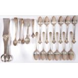 A SET OF SIX GEORGE V ORNATE PIERCED SILVER COFFEE SPOONS, BY CHARLES BOYTON AND SON, LONDON 1914, A