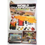 A SCALEXTRIC WORLD CHAMPIONSHIP SET, APPARENTLY COMPLETE, INCLUDING FOUR RACING CARS, BOXED (LID