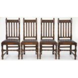 A SET OF FOUR OAK DINING CHAIRS, THE BACK WITH GUILLOCHE RAIL, BUN FINIALS AND SPIRAL UPRIGHTS, SEAT