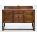 AN OAK SIDEBOARD, 108CM H; 49 X 136CM, C1930 Minor scratches on top