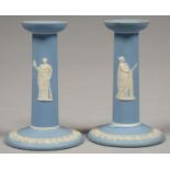 A PAIR OF WEDGWOOD BLUE JASPER DIP DWARF CANDLESTICKS, 15CM H, IMPRESSED MARKS, 1882 One with