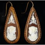 A PAIR OF VICTORIAN TEAR SHAPED CAMEO EARRINGS, THE OVAL SHELL CARVED WITH THE HEAD OF A MAIDEN,
