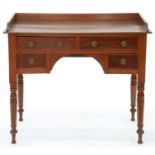 A VICTORIAN MAHOGANY WASHSTAND, FITTED WITH FOUR DRAWERS ABOUT THE ARCHED APRON, ON RING TURNED