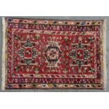 A RUG, 65 X 84CM Good condition, requiring a light clean