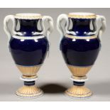 A PAIR OF MEISSEN COBALT AND GILT VASES IN EMPIRE STYLE, WITH SNAKE HANDLES, 27CM H, IMPRESSED