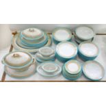 AN EXTENSIVE ROYAL WORCESTER SEPIA PRINTED AND TURQUOISE BORDERED EARTHENWARE DINNER SERVICE,