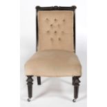 A VICTORIAN EBONISED NURSING CHAIR Nursing chair decoration worn and rubbed