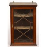 A VICTORIAN MAHOGANY HANGING CABINET WITH DENTIL CORNICE, ENCLOSED BY A THIRTEEN PANE GLAZED DOOR,