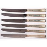 A SET OF SIX ELIZABETH II SILVER HAFTED TABLE KNIVES OF CHAMFERED DESIGN, BY CARRS, SHEFFIELD 1998