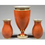 ONE AND A PAIR OF ROYAL COPENHAGEN VASES, IN CRACKLED ORANGE GLAZE AND GILT, 17.5 AND 30CM H,