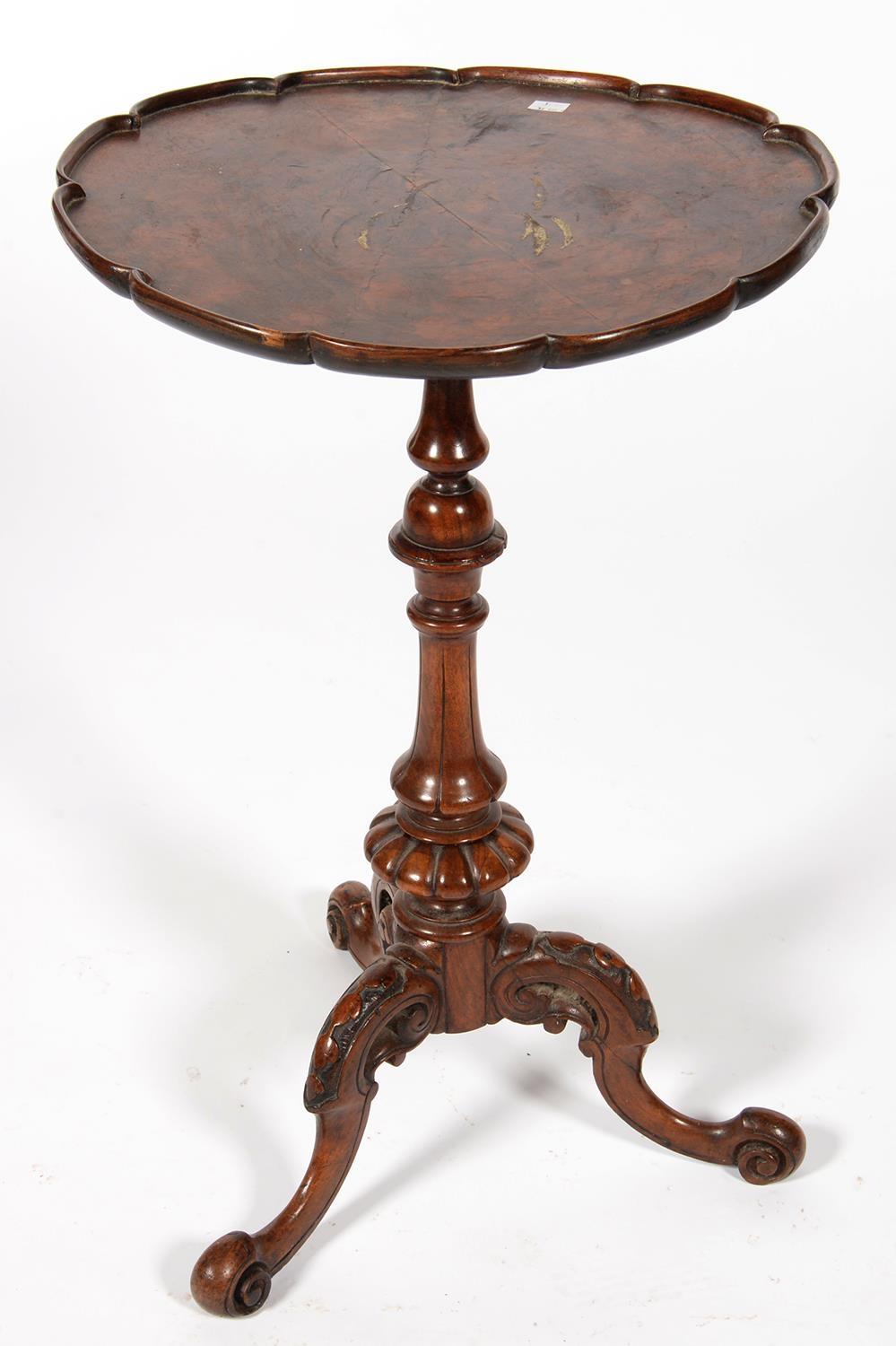 A VICTORIAN WALNUT TRIPOD TABLE, 70CM H; 44CM DIA The associated top slightly warped and stained