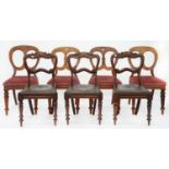 A SET OF THREE VICTORIAN MAHOGANY KIDNEY BACK DINING CHAIRS ON TURNED LEGS AND A SET OF FOUR