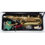 A REVOLUTION BRASS SAXOPHONE, CASED Practically as new