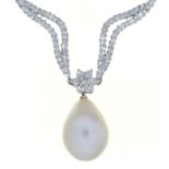 A DIAMOND NECKLET OF 'LIPS' LINKS, WITH CENTRAL ROSETTE AND PEAR SHAPED CULTURED PEARL DROP OF