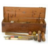 A JOHN JAQUES AND SON LIMITED CROQUET SET IN MAKER'S DEAL BOX WITH FRAGMENTARY WHITE AND GREEN