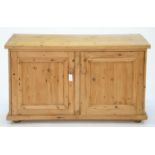 A PINE DRESSER, 73CM H; 50 X 125CM, A PINE TWO DOOR CUPBOARD AND A LIGHT WOOD CHAIR Household dirt