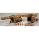 A PAIR OF ALABASTER MODEL CANNON, 19TH C, 31CM L, LATE 19TH C On one trunnions and back ring re-