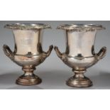 A PAIR OF OLD SHEFFIELD PLATE WINE COOLERS OF CAMPANA SHAPE WITH LEAFY SCROLLING HANDLES, THE