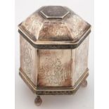 A CONTINENTAL HEXAGONAL SILVER BOX AND DOMED COVER, THE SIDES ENGRAVED WITH FIGURES, THE COVER