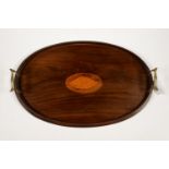 AN EDWARDIAN OVAL INLAID MAHOGANY GALLERY TRAY WITH BRASS HANDLES, 59CM L Good condition