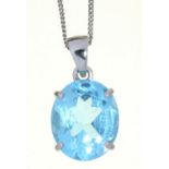 A BLUE STONE PENDANT IN 9CT WHITE GOLD, 10MM EXCLUDING LOOP AND A WHITE GOLD NECKLET MARKED 375,