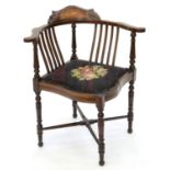 AN EDWARDIAN INLAID AND MAHOGANY-STAINED CORNER CHAIR WITH PADDED FLORAL WOOLWORK SEAT, SEAT