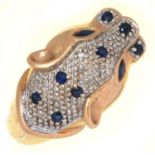A DIAMOND AND SAPPHIRE BIG CAT RING IN GOLD, UNMARKED, 7.6G, SIZE U½ Slight wear to hoop