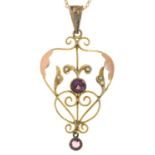 AN ART NOUVEAU AMETHYST, SPLIT PEARL AND TWO COLOUR GOLD OPENWORK PENDANT, 40MM EXCLUDING LATER GOLD