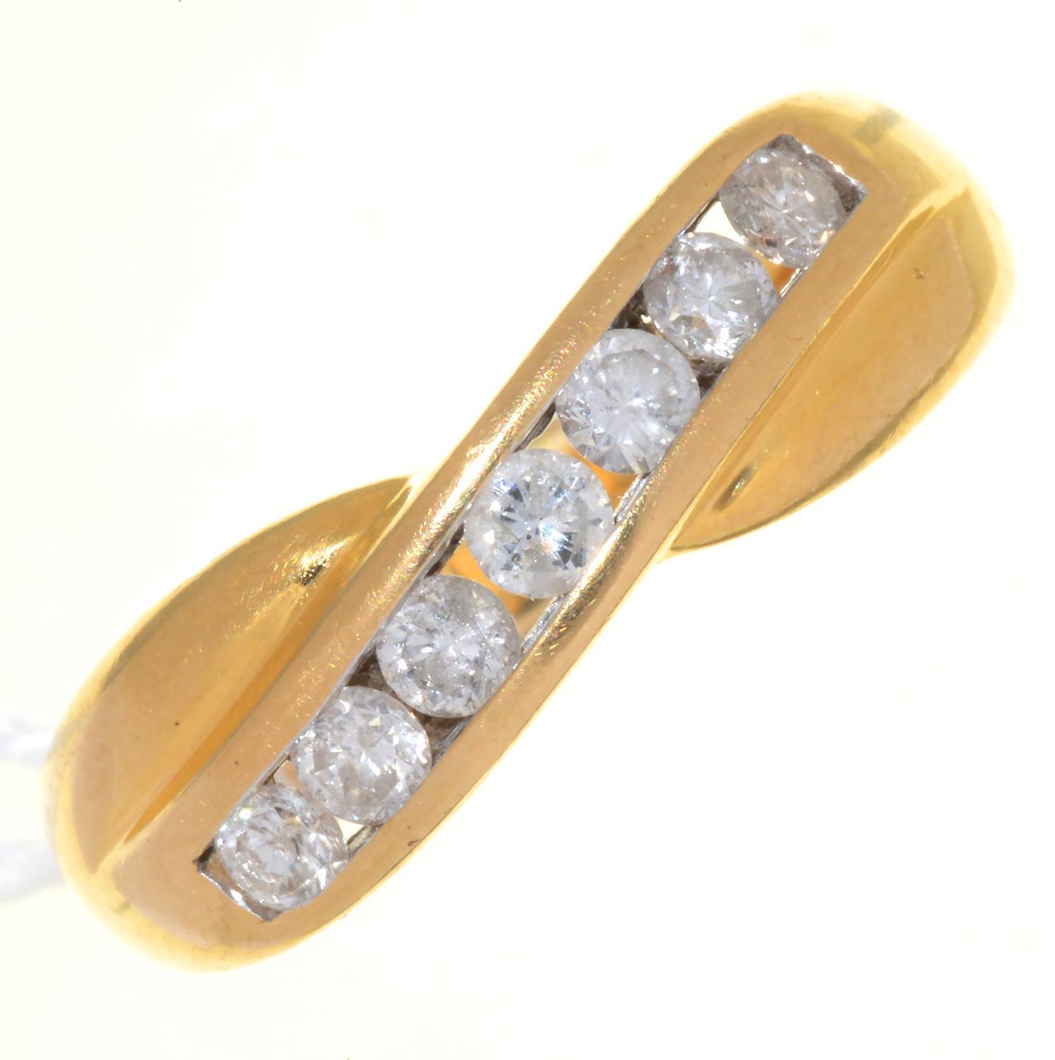 A DIAMOND TWIST RING IN 18CT GOLD, 5G, SIZE O½ Good condition