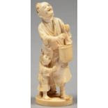 A TOKYO SCHOOL IVORY OKIMONO OF A FARMER AND HIS YOUNG SON, 17.5CM H, SIGNED, MEIJI PERIOD Farmer