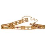 A RUBY, SPLIT PEARL AND GOLD GATE BRACELET, EARLY 20TH C  1cm l, marked 9c, 13.8g Good condition