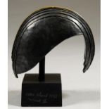 PETER WARD (1932-2003)  HELMET II pewter, partly gold painted on slate base, signed, dated 1995