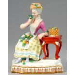 A MEISSEN FIGURE OF SMELL FROM THE FIVE SENSES, 19TH C  after the model by Johann Carl Schoenheit,